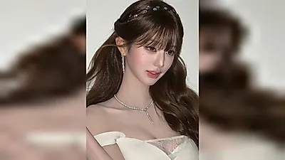 Jang Won-young showcases off-the-shoulder dress at luxury event in Milan