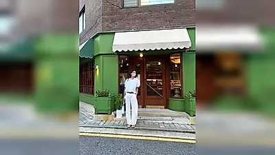 Actress Claudia Kim showcases an all-white look worthy of her 177cm model background