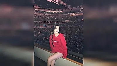 KAZUHA completes street look with overfit red hoodie in the United States